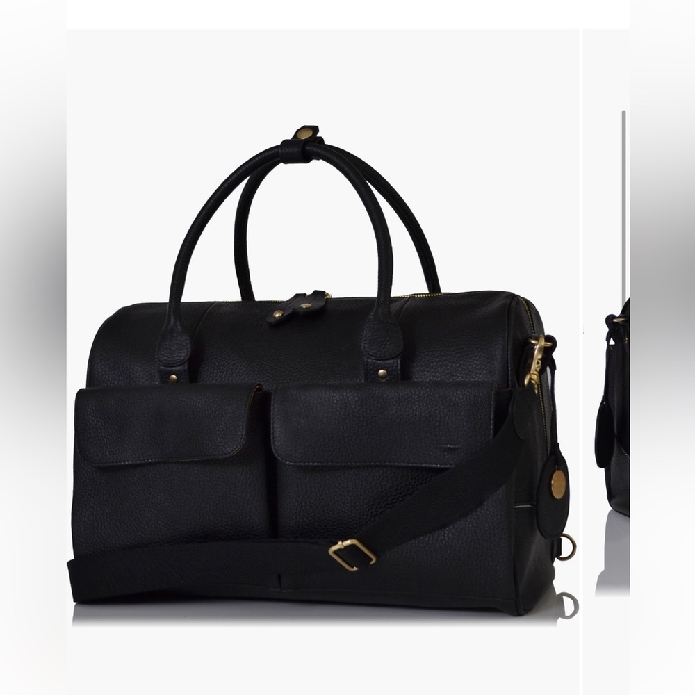 With use for a week it looks new diaper bag (pacapod) black leather